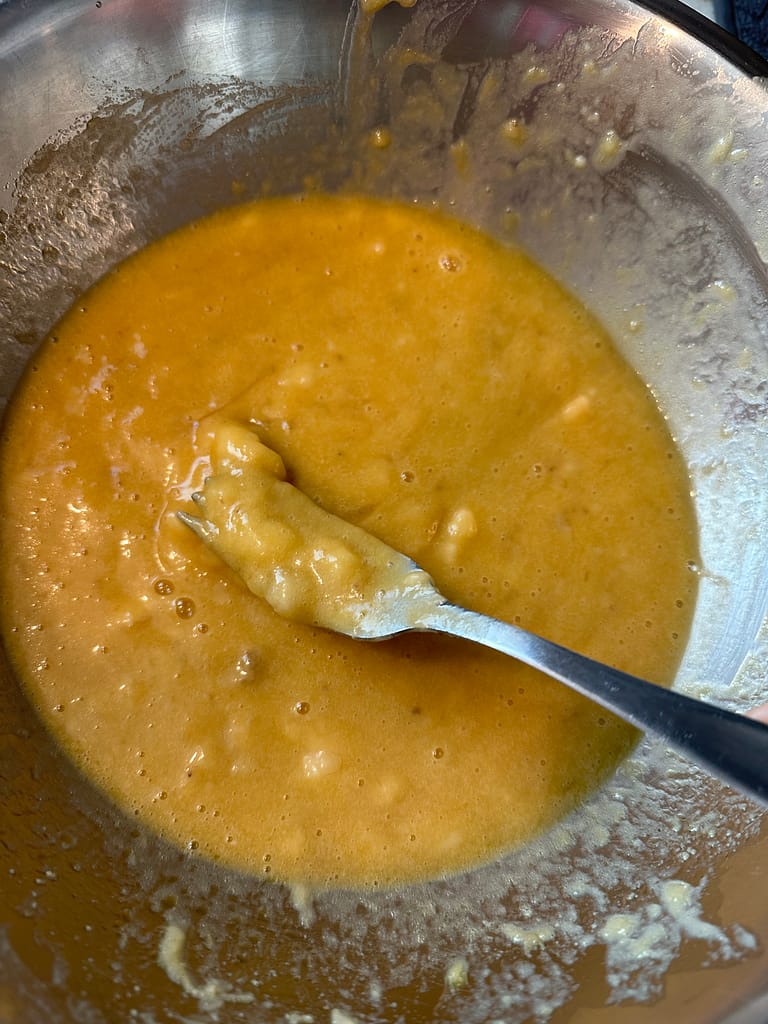 Mashed banana, melted butter, vanilla extract and whisked eggs