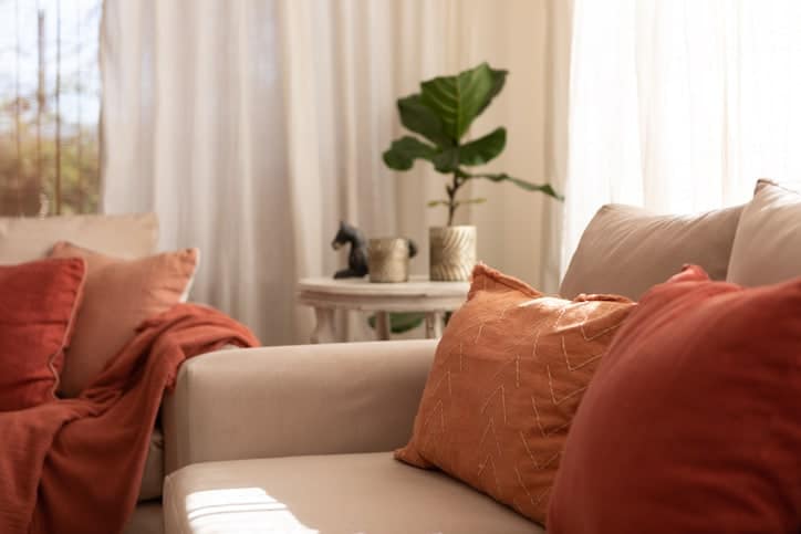 Beautiful living-room decorated in palette of warm colors